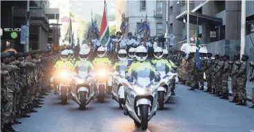  ?? PHANDO JIKELO African News Agency (ANA) ?? MEMBERS of the SANDF rehearse in the city centre ahead of the much-anticipate­d State of the Nation Address by President Cyril Ramaphosa at 7pm. |