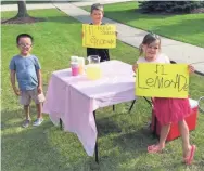  ?? ALISON SHERWOOD ?? When you’re 7, 5 and 4, running a lemonade stand is chock-full of lessons, from marketing to customer service to math.