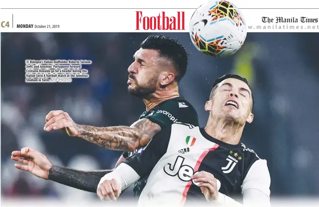  ?? AFP PHOTO ?? Bologna’s Italian midfielder Roberto Soriano (left) and Juventus’ Portuguese forward Cristiano Ronaldo go for a header during the Italian Serie A football match at the Juventus Stadium in Turin.