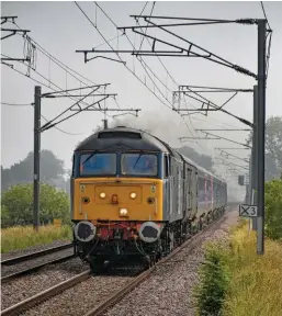  ?? TOBY RADZISZEWS­KI. ?? Rail Operations Group 47815 Lost Boys 68-88 powers south through Waterbeach on June 15, with the 0730 Potter Group, Ely-Sims Group, Newport scrap move, taking six former Great Western Railway High Speed Train Mk 3s for dismantlin­g. Almost 160 HST Mk 3s have now been scrapped, with a similar number yet to be taken out of traffic.