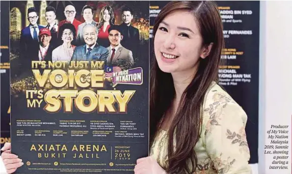  ??  ?? Producer of My Voice My Nation Malaysia 2019, Sannie Lee, showing a poster during a interview.