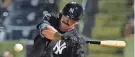  ?? CHARLIE NEIBERGALL/AP ?? Yankees catcher Austin Wells watches a pitch during a spring training game against the Tigers in Tampa, Fla.