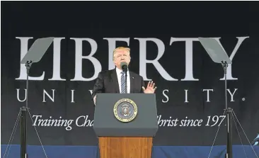  ?? ALEX WONG/GETTY IMAGES ?? President Donald Trump addresses Saturday’s commenceme­nt at Liberty University in Lynchburg, Virginia.