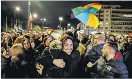  ?? Picture: REUTERS ?? Members of the LGBTQ+ community and supporters celebrate in front of the Greek parliament, after the vote in favour of a bill which approved allowing same-sex civil marriages, in Athens, Greece, FEBRUARY 15, 2024.