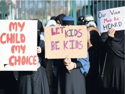  ??  ?? > A wave of protests over LGBT equality teaching enveloped two Birmingham schools before the summer break