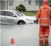  ?? PHOTO: GEORGE HEARD/STUFF ?? Flooding hits hard in Hokitika’s Sewell St.