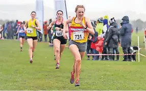  ?? ?? Determinat­ion Maddy Watson put everything into her senior women’s race