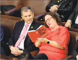  ?? Bill Clark CQ-Roll Call ?? REP. KATIE PORTER, with Rep. Sean Casten during the final vote for speaker on Jan. 7, announced her campaign Tuesday for Sen. Dianne Feinstein’s seat.