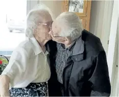  ?? DIANNE PHILLIPS HANDOUT/ THE CANADIAN PRESS ?? Herbert and Audrey Goodine kiss in a handout photo. The New Brunswick couple bid a tearful goodbye this week, separated to different care facilities just days before Christmas after 73 years together.