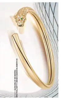  ??  ?? Cartier Panthère de Cartier bangle in yellow gold set with onyx, emeralds and diamonds