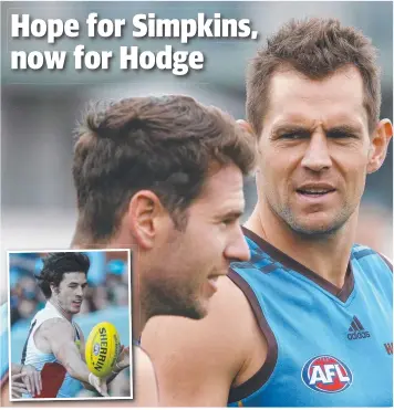  ??  ?? REUNION BID: Jonathan Simpkin and Luke Hodge in their Hawthorn days. INSET: Tom Simpkin.