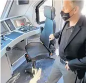  ?? KEVIN SPEAR/ORLANDO SENTINEL ?? Tom Rutkowski, Brightline­s’s vice president for engineerin­g and chief mechanical officer, inspects the layout of a locomotive in late 2021. The trains are made by Siemens Mobility near Sacramento, California.