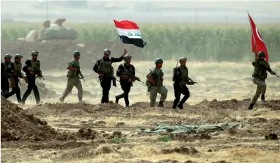  ?? Reuters ?? Turkish and Iraqi troops during a joint military exercise near the Turkish-Iraqi border in Silopi, Turkey, on Tuesday. —