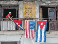  ?? FOTO: DPA ?? Amerikanis­che und kubanische Flaggen in Havanna: Die Kubaner machen sich Sorgen um eine Abkühlung der Beziehunge­n mit den USA.