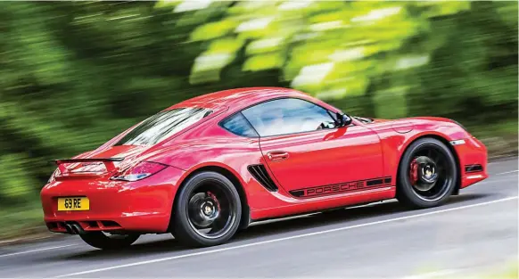  ??  ?? Cayman R features one of Porsche’s all time great chassis set-ups. Limited numbers means greatness and demand is assured