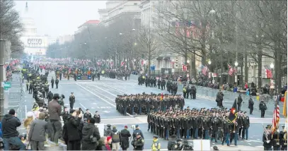  ?? Cliff Owen ?? The Associated Press file Military units participat­e Jan. 20, 2017, in the inaugural parade from the Capitol to the White House in Washington.