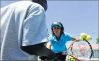  ?? PICTURE: LEON LESTRADE ?? REWARDING: Western Province Tennis president Zaida Beukes coaches youngsters at Pollsmoor Prison.