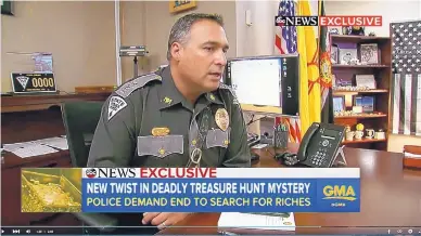  ?? SOURCE: ABC NEWS ?? On camera for ABC News, State Police Chief Pete Kassetas talks to Forrest Fenn about the treasure hunt the Santa Fe author has inspired. After a second person apparently died searching for the treasure chest that Fenn says he’s hidden in the Rocky...