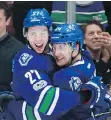  ?? JEFF VINNICK/ NHLI VIA GETTY IMAGES/FILES ?? Ben Hutton, left, hugging Reid Boucher, finished second among rookie blue-liners with 24 assists two seasons ago.