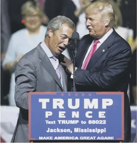  ??  ?? 0 Donald Trump greets Nigel Farage during a campaign rally in Jackson, Mississipp­i, in 2016