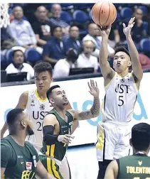  ?? ALVIN S. GO ?? POSTPONED GAMES at the weekend because of the effects of Typhoon Ompong included that between the UST Growling Tigers and UP Fighting Maroons on Sept. 16.