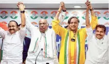  ?? PTI ?? (From left) Congress leader V.D. Satheesan, party chief Mallikarju­n Kharge and candidates for the Lok Sabha election Shashi Tharoor and Adoor Prakash during a function on Wednesday.