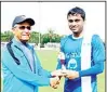  ??  ?? Tony Gonsalves presenting Man of the Match to Loyd Mascarenha­s.