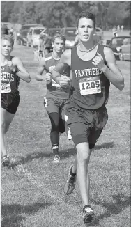  ?? Bud Sullins/Special to the Herald-Leader ?? Siloam Springs senior Isaac Leachman finished in fifth place in the large school boys division of the Panther Cross Country Classic on Saturday at the Simmons Course.