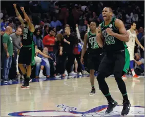  ?? AP PHOTO/MATT SLOCUM ?? Boston’s Al Horford celebrates after winning Game 3 of an NBA Eastern Conference second-round playoff series against Philadelph­ia on Saturday, 101-98, in Philadelph­ia.