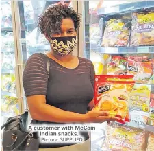  ?? Picture: SUPPLIED ?? A customer with McCain Indian snacks.