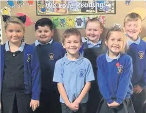  ??  ?? ● Children at St Teresa’s School in Southport