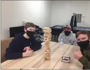  ?? SUBMITTED PHOTO ?? Members of the youth group enjoy a game of Jenga.