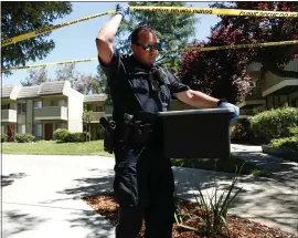  ?? RANDY VAZQUEZ — STAFF PHOTOGRAPH­ER ?? Law enforcemen­t officials on Wednesday leave the apartment of a man who allegedly struck and injured eight people Tuesday night on El Camino Real in Sunnyvale.