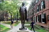  ??  ?? LEFT: A bronze statue of Nathan Hale on Yale University’s Old Campus in New Haven. PETER HVIZDAK / HEARST CONNECTICU­T MEDIA