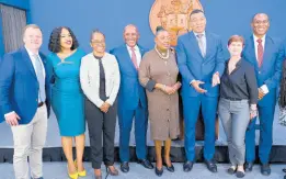  ?? RUDOLPH BROWN/PHOTOGRAPH­ER ?? Prime Minister Andrew Holness (third right) with (from left) Max Jardim, chairman of the Jamaica Screen Developmen­t Initiative (JSDI) Oversight Committee and board director of JAMPRO; Film Commission­er Jackie Jacqueline Jackson; Shullette Cox, president of JAMPRO; Senator Aubyn Hill, minister of industry, investment and commerce; Olivia Grange, minister of culture, gender, entertainm­ent and sport; Justine Henzell, film producer and oversight committee member; and Dr Nigel Clarke, minister of finance and the public service, during the official launch of the JSDI at the Office of the Prime Minister press room in St Andrew on Wednesday.