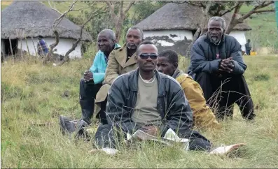  ??  ?? Sikosiphe Bazooka Radebe and local residents, at Tribal Komkulu. Radebe was gunned down in a suspected hit last year.