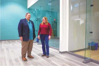  ?? JON AUSTRIA/JOURNAL ?? Pajarito Powder CEO Tom Stephenson and project principal investigat­or Michele Ostraat stand in Pajarito’s new facility in December 2023.