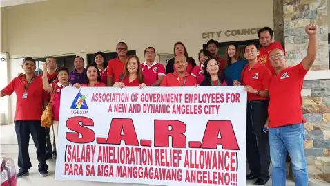  ?? Chris Navarro ?? AGENDA officers led by President Eddie Sanchez trooped to the Angeles City Council recently to appeal the granting of the Salary Ameliorati­on Relief Allowance for City Government Employees. The City Council has approved a resolution asking Mayor...