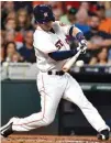  ?? Associated Press ?? Houston Astros’ Alex Bregman hits an RBI-single Saturday during the fourth inning against the Tampa Bay Rays in Houston.