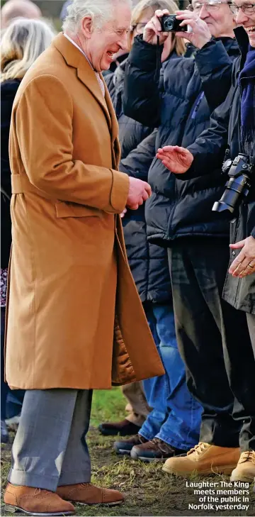  ?? ?? Laughter: The King meets members of the public in Norfolk yesterday