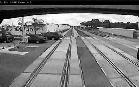  ?? FDOT ?? A still frame from a video of the SunRail crash on June 27 shows how much of the SUV’s back end is still on train track.