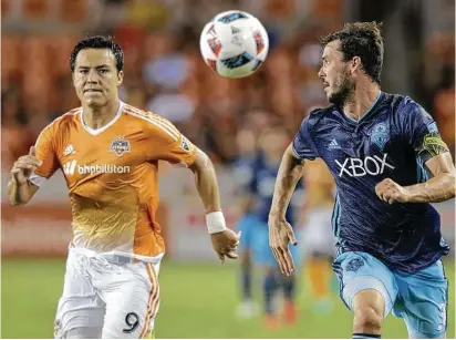  ?? Elizabeth Conley / Houston Chronicle ?? Dynamo forward Erick Torres, left, is back with the team, leaner and with a singular purpose — to make the most of his second opportunit­y with Houston’s Major League Soccer club. His first stint with the Dynamo did not end well.