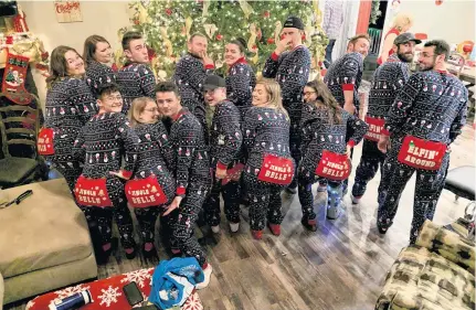  ??  ?? JD Gilmour enjoys being with his family in Ontario during Christmas — and even wearing matching holiday PJS with his 18 cousins. But because of COVID-19, he won’t be able to travel from his home in Charlottet­own to be with family this year.