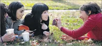  ?? Katie Falkenberg
Los Angeles Times ?? PAST MEETS PRESENT as Didi Conn, right, who portrayed Frenchy in the 1978 film, huddles with, from left, Kether Donohue, Vanessa Hudgens and the TV Frenchy, Carly Rae Jepsen.