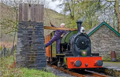  ?? JOEY EVANS ?? Former Corris Railway 0-4-2ST No. 4 ‘Edward Thomas’ pauses for water at Dolgoch during a David Williams photo event at the Talyllyn Railway on March 17 – the last charter at any preserved line prior to lockdown.