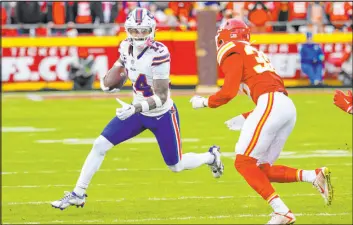  ?? Reed Hoffmann The Associated Press ?? Bills receiver Stefon Diggs, trying to avoid Chiefs linebacker Nick Bolton last week during Buffalo’s 20-17 victory, says his team is better than its 7-6 record.