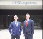  ?? Hearst Connecticu­t Media file photo ?? XPO Logistics CEO Bradley Jacobs, left, and President Troy Cooper outside the company’s headquarte­rs at 5 American Lane in Greenwich on July 25, 2017.