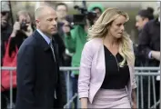  ?? SETH WENIG — THE ASSOCIATED PRESS FILE ?? Stormy Daniels and her attorney, Michael Avenatti, leave federal court in New York.