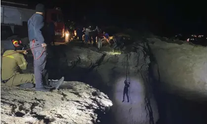  ?? Photograph: Ippolytos Prekas/AP ?? A migrant being saved during a large-scale rescue operation on the island of Kythira.