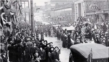  ?? ST. CATHARINES MUSEUM SPECIAL TO TORSTAR ?? A huge victory parade at the end of the First World War was held in downtown St. Catharines in November 1918 in the midst of the Spanish Influenza pandemic.